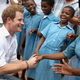 Illustration for article titled Your Boyfriend Prince Harry Grins His Way Through a Visit to Lesotho